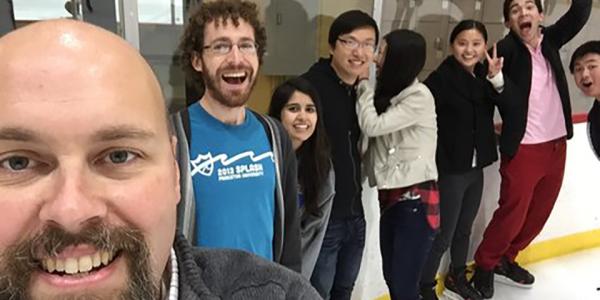 Professor Timothy Sherwood having fun with students at an ice rink.  Photo courtesy of Timothy Sherwood.