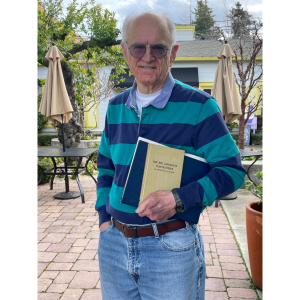 Stephen Maskel with his thesis completed under the guidance of Dr. Wenner along with a copy of Dr. Wenner's book, The Bee Language Controversy: An Experience in Science.