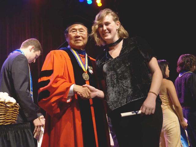 UCSB Chancellor Yang shakes the first of thousands of hands of UCSB's 2018 Commencement season; Photo: Sonia Fernandez