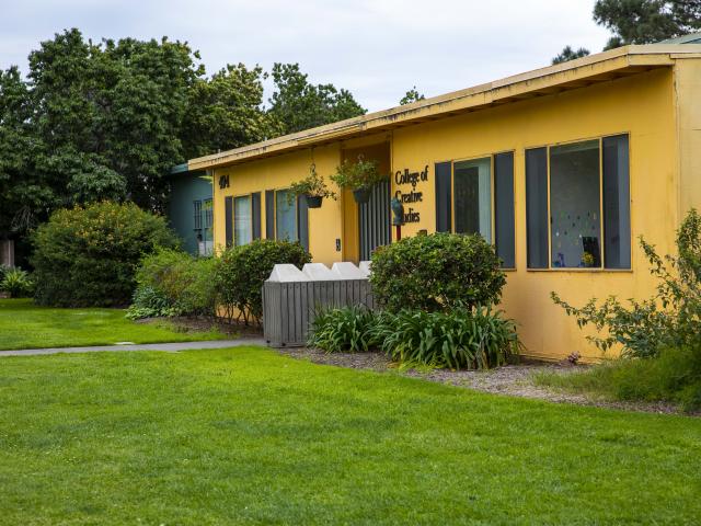 The iconic yellow and green coloring of the CCS building was chosen by CCS Art Faculty Hank Pitcher.