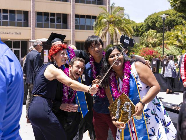 Sara with students at 2019 CCS Commencement