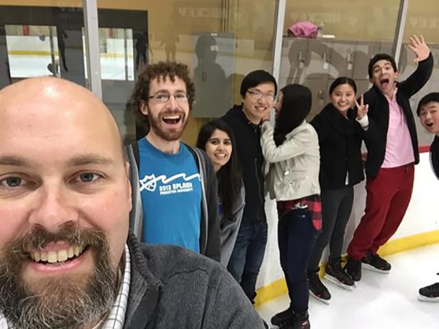 Professor Timothy Sherwood having fun with students at an ice rink.  Photo courtesy of Timothy Sherwood.