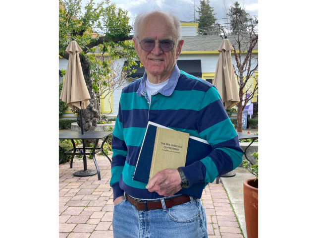 Stephen Maskel with his thesis completed under the guidance of Dr. Wenner along with a copy of Dr. Wenner's book, The Bee Language Controversy: An Experience in Science.