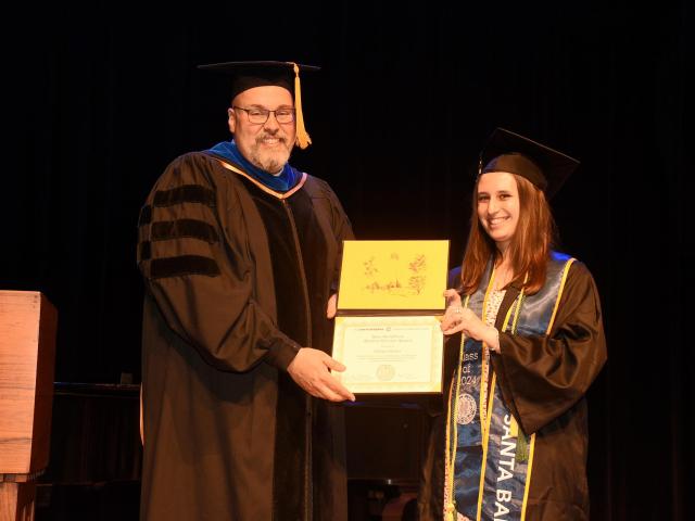 CCS Interim Dean Timothy Sherwood presents award to Elaina Smolin ‘24 (CCS Writing & Literature) at CCS Commencement on June 9, 2024.