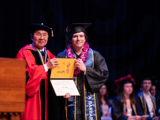 Chancellor Henry Yang presents award to Guy Wilks ‘24 (CCS Computing)