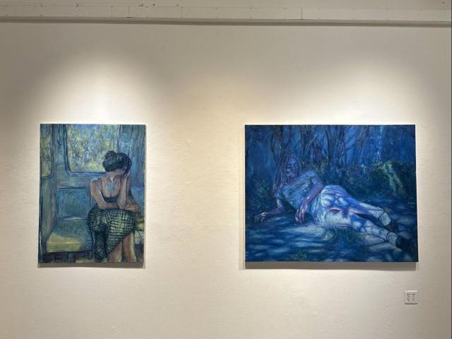 Samantha’s paintings hanging in the CCS gallery