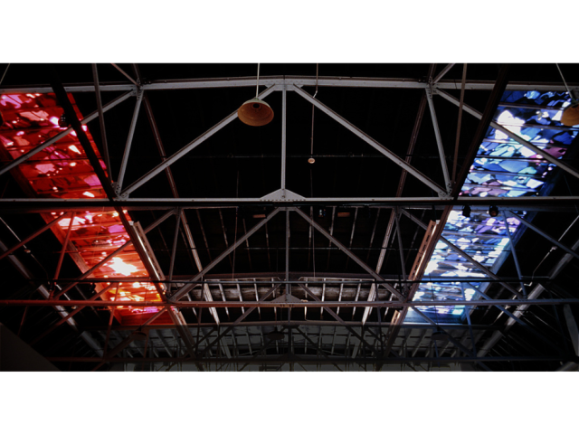 Jane Mulfinger Installation: Armory as Cathedral: Beyond the Visible Spectrum, 2002 two 45' x 7' skylights, second-hand clothing