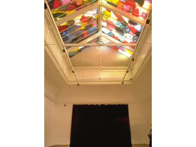 Jane Mulfinger Installation: Rhoberts, I. 1989. 1200sq.ft, recycled clothing, wood, black fabric Oriel Mostyn, Llandudno, Wales