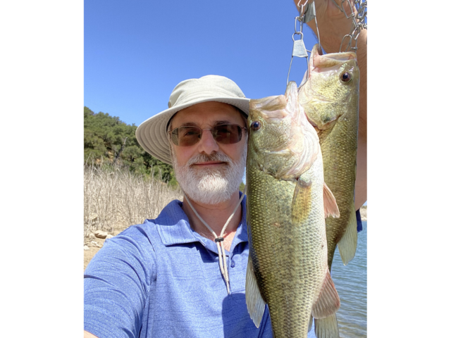 Leroy Laverman ‘99 (UCSB Ph.D. Chemistry) enjoys fishing at Cachuma Lake, 2025. Leroy’s pro tip: hold the fish close to the camera so it looks bigger. 