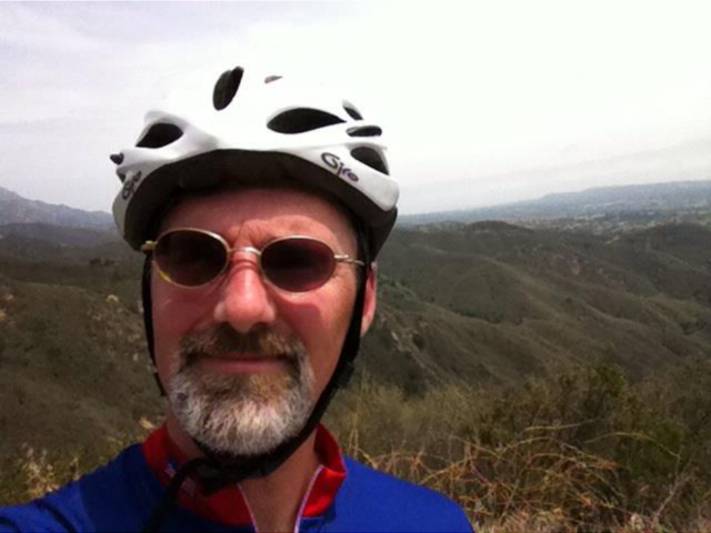 Leroy Laverman ‘99 (UCSB Ph.D. Chemistry) biking (slowly) up old San Marcos pass, 2024. 