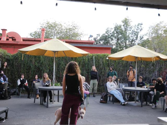 Tuesday Mahdavi ’28 (CCS Biology, Writing & Literature) gives a live demonstration on dog training